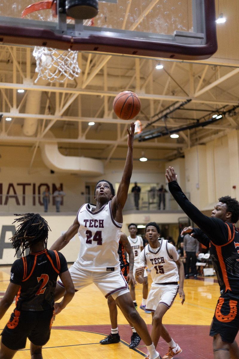 Basketball player going up for a layup